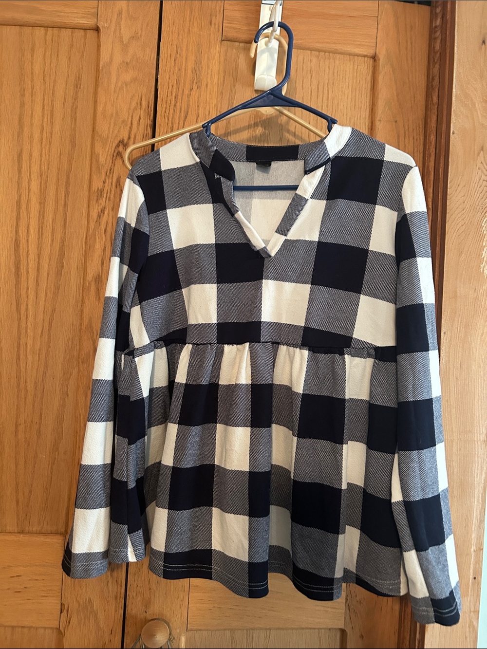 Women’s Black and White Plaid Long-Sleeve Peplum Top